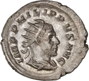 Buste radié et drapé de Philippe Ier à droite.