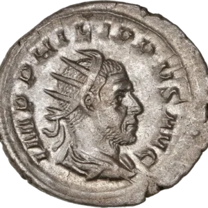 Buste radié et drapé de Philippe Ier à droite.