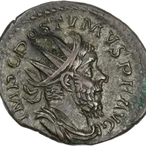 Buste radié, drapé et cuirassé de Postume à droite.