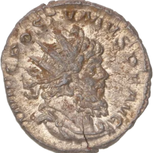 Buste radié, drapé et cuirassé de Postume à droite.