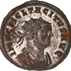 Buste radié et cuirassé de Tacite à droite.