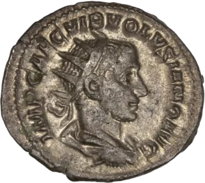 Buste radié, drapé et cuirassé de l'empereur à droite.