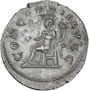 Concordia assise à gauche, tenant une patère et une double corne d'abondance.