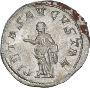 Pietas (la Piété) voilée et diadémée, debout de face tournée à gauche, levant la main droite et tenant une boite à encens de la main gauche.