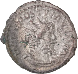 Buste radié, drapé et cuirassé de Postume à droite.