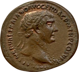 Tête laurée de Trajan à droite.