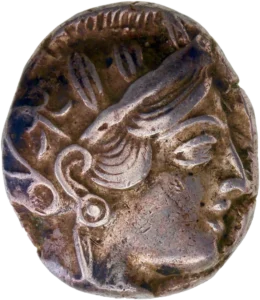 Tête casquée de la déesse Athéna à droite.