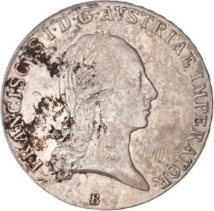 Tête laurée de François Joseph Ier à droite.