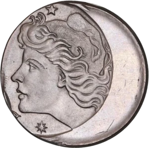 Tête de la république à gauche, coiffée d'un bonnet phrygien.