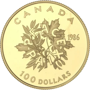 Le mot Paix écrit en français et en anglais sur une branche d'érable.