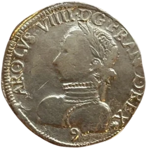 Buste cuirassé et lauré de. Charles IX à gauche.