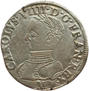 Buste cuirassé et lauré de. Charles IX à gauche.