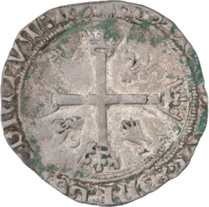 Croix terminée par des couronnes et entouré de lis et d'hermines.