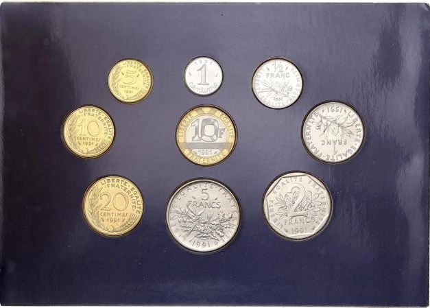 Coffret Monnaie de Paris "brillant universel" 1991.Coffret rare (2500 exemplaires) contenant les rares monnaies de 1 centime et 2 francs.