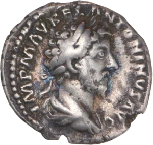 Tête laurée de Marc Aurèle à droite.