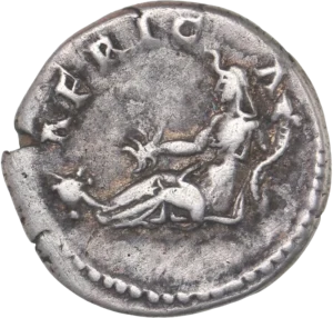 Tête laurée d'Hadrien à droite.