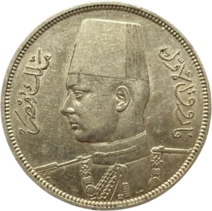 Buste du Roi Farouk à gauche.