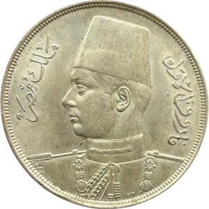 Buste du Roi Farouk à gauche.