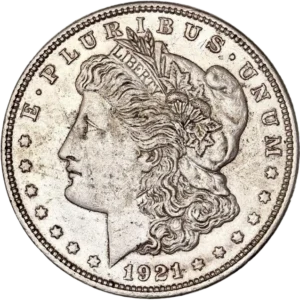 Tête de l'allégorie de la Liberté tournée à gauche et portant le bonnet phrygien, un ruban marqué LIBERTY et une couronne végétale.