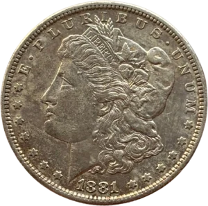 Tête de l'allégorie de la Liberté tournée à gauche et portant le bonnet phrygien, un ruban marqué LIBERTY et une couronne végétale.