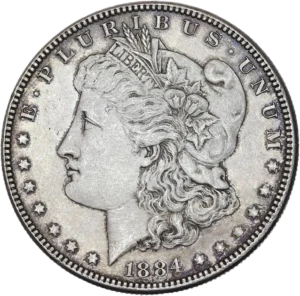 Tête de l'allégorie de la Liberté tournée à gauche et portant le bonnet phrygien, un ruban marqué LIBERTY et une couronne végétale.