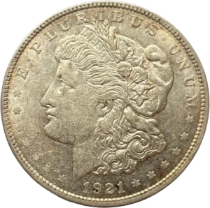 Tête de l'allégorie de la Liberté tournée à gauche et portant le bonnet phrygien, un ruban marqué LIBERTY et une couronne végétale.