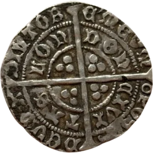 Croix entourée d'annelets.