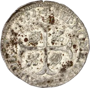 Croix cantonnée de couronnes et de lis.