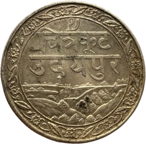 Vue de la ville d'Udaipur et de son enceinte, décorations florales en cercle. légende en Hindi.