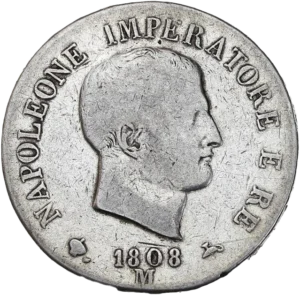 Tête nue de Napoléon Ier à droite.