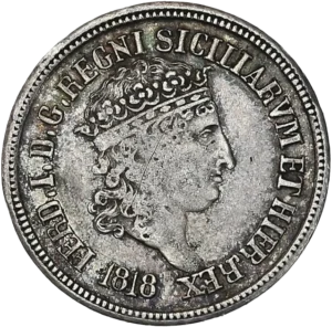 Tête couronnée de Ferdinand Ier à droite.