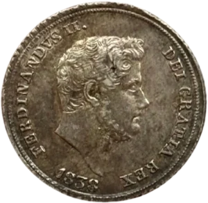 Tête nue de Ferdinand II à droite.