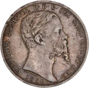 Tête de Victor Emmanuel II à droite.