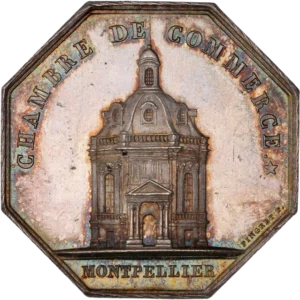 Une ancre dont l'axe est fait d'un caducée ailé dans une couronne d'une branche d'olivier et d'un sarment de vigne portant une grappe.