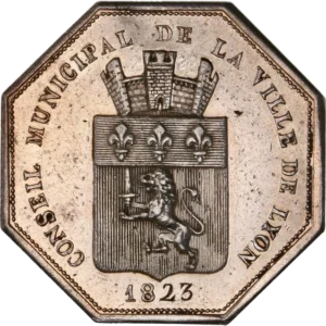 Blason à attribution entouré couronne végétale.