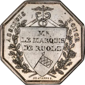 Armoiries surmontées d'une couronne tourellée.