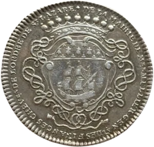 Écu rond timbré d’une couronne de marquis, posé sur une croix de Saint-Lazare et entouré du collier de l’ordre.