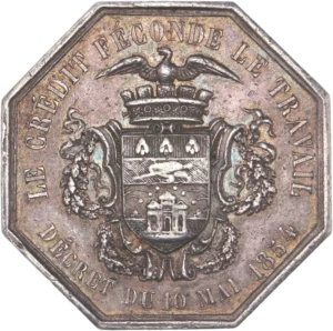 Écu aux armes de Lille tourelé et surmonté d'un aigle.