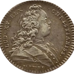 Buste habillé du roi jeune à droite.