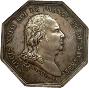 Buste du Roi Louis XVIII à gauche.