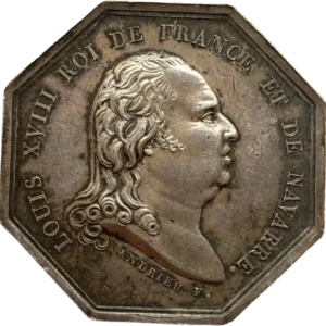 Buste du Roi Louis XVIII à gauche.