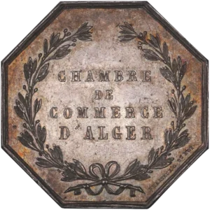 Inscription dans une couronne végétale.