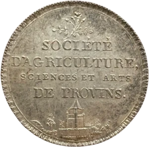 Inscription en quatre lignes entre une rose et une tour.