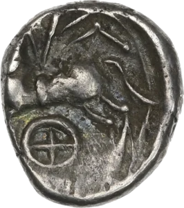 Cheval bridé allant a gauche. Entre ses pattes, une roue.