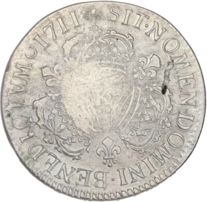 Lettre d'atelier entourée de couronnes et de lis.