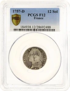 Tête de Louis XV à gauche.