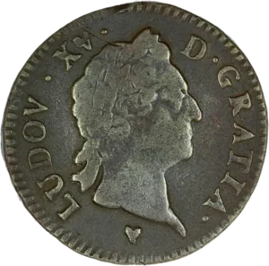 Tête laurée de Louis XV à droite.