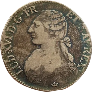 Tête laurée de Louis XV à gauche.