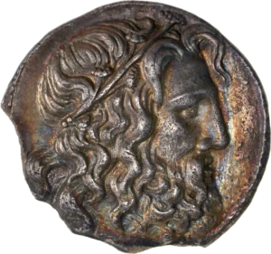 Tête de Poséïdon à droite.