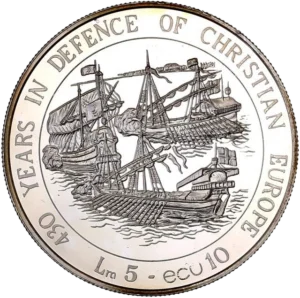 Blason couronné entouré d'une couronne végétale.